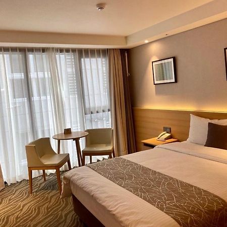 Seogwipo Js Hotel Bagian luar foto