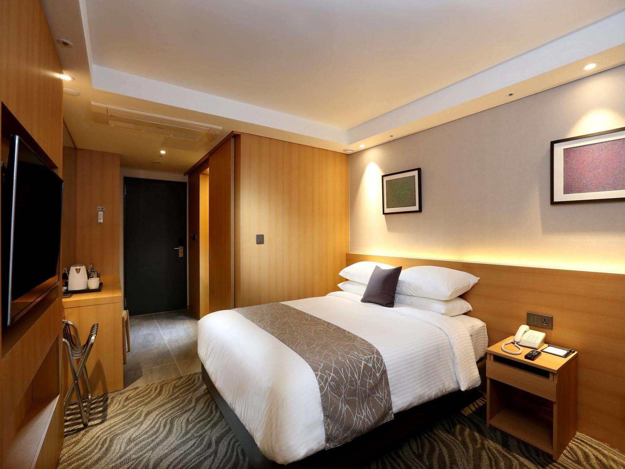 Seogwipo Js Hotel Bagian luar foto